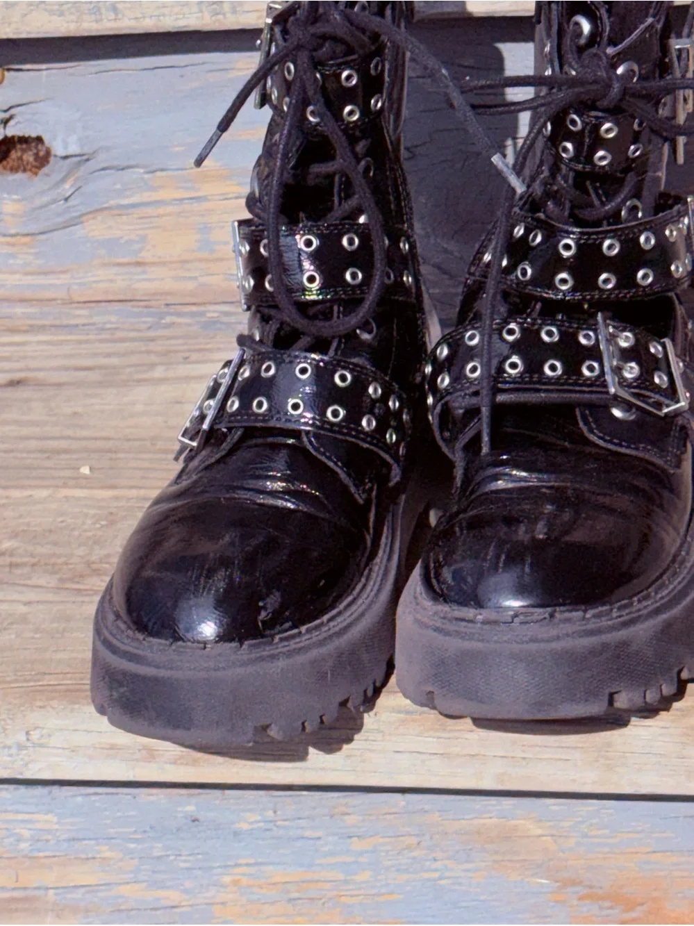 Zara black patent leather buckle combat moto boots, featuring a glossy finish 34